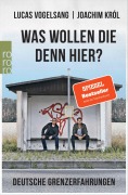 Cover-Bild zum Titel 'Was wollen die denn hier?' von 'Joachim Król, Lucas Vogelsang'