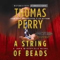 Cover-Bild zum Titel 'A String of Beads Lib/E: A Jane Whitefield Novel' von 'Thomas Perry'