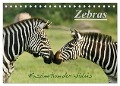 Zebras - Faszination der Wildnis (Tischkalender 2025 DIN A5 quer), CALVENDO Monatskalender - Nadine Haase