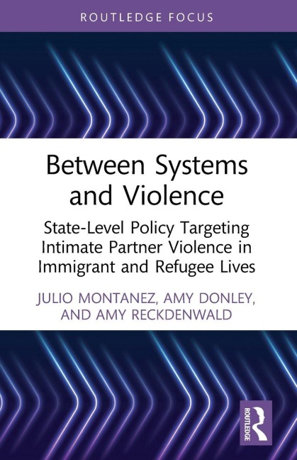 Between Systems and Violence - Julio Montanez, Amy Reckdenwald, Amy Donley
