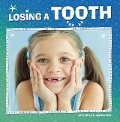 Losing a Tooth - Nicole A. Mansfield
