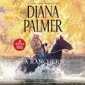 A Rancher's Kiss Lib/E: A 2-In-1 Collection - Diana Palmer